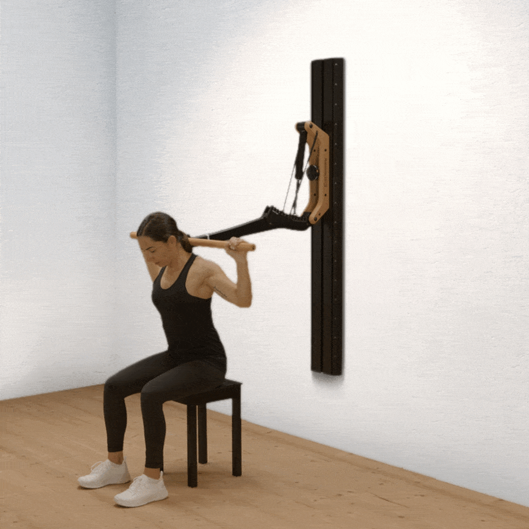 072 Schulterdrücken hinter dem Kopf sitzend